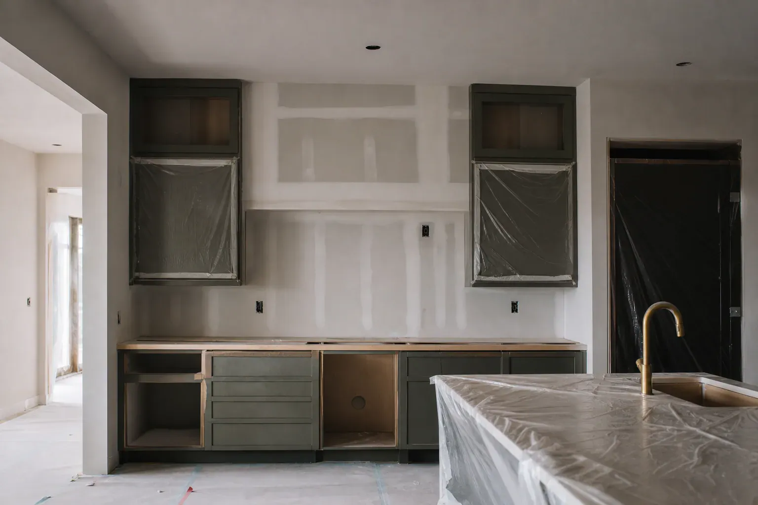 Custom oak cabinets — a rebuilt kitchen wall section blended into the surrounding surface